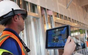 Use augmented reality in construction to visualize pipes behind walls.